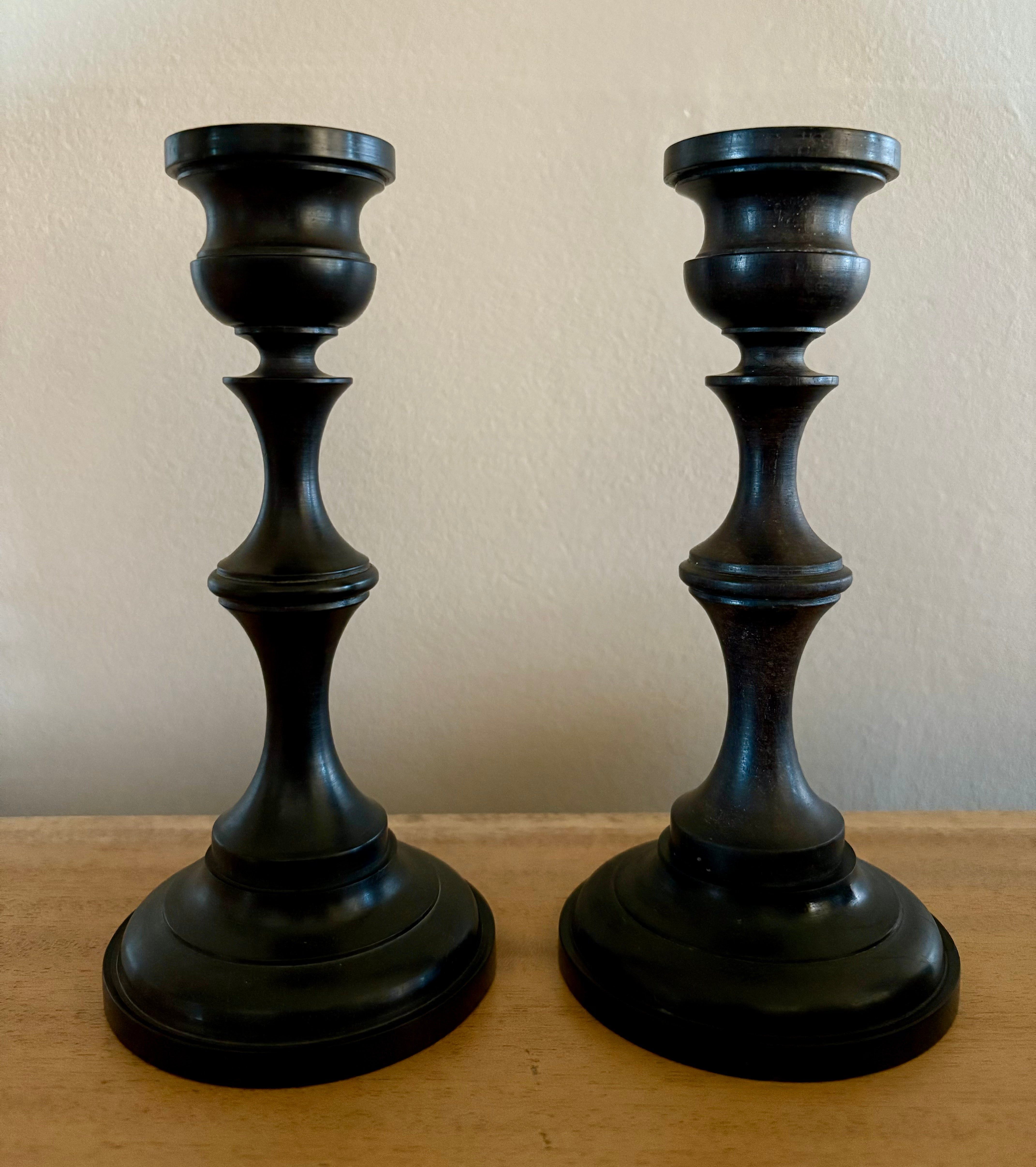 A Pair of Ebony Candlesticks